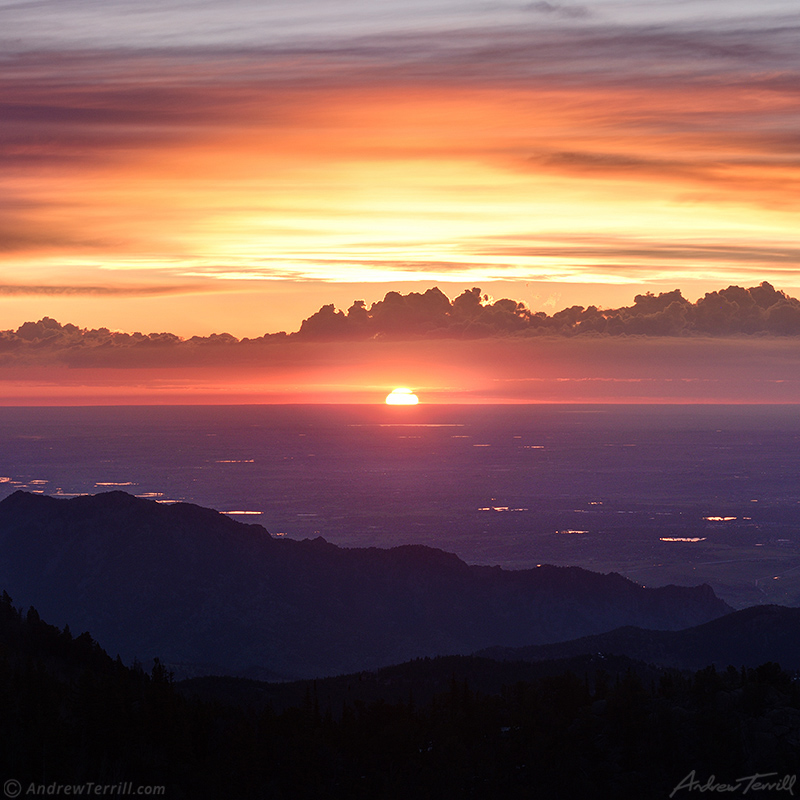 sun bursting over the horizon in the great plains seen from rocky mountains colorado sunrise