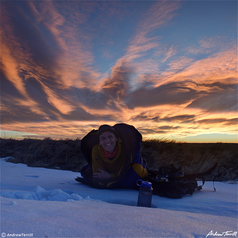 cowboy camping bivvy on snow at sunrise andrew terrill