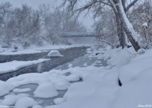 clear creek in golden colorado during snowstorm march 2021