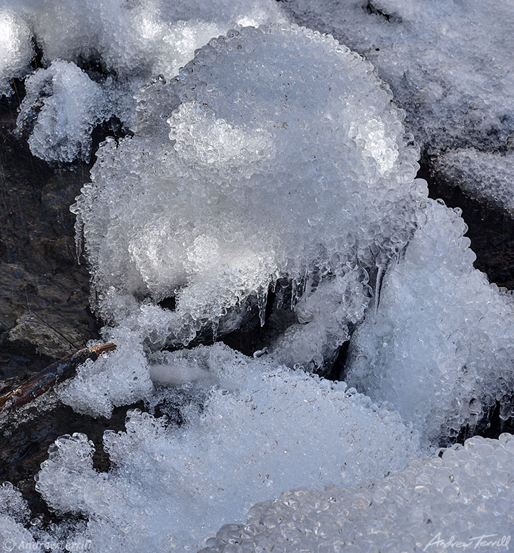 ice on rocks near waterfall winter golden colorado rocky mountains