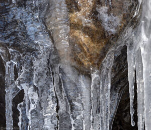 icicles hanging on rocks and ice colorado