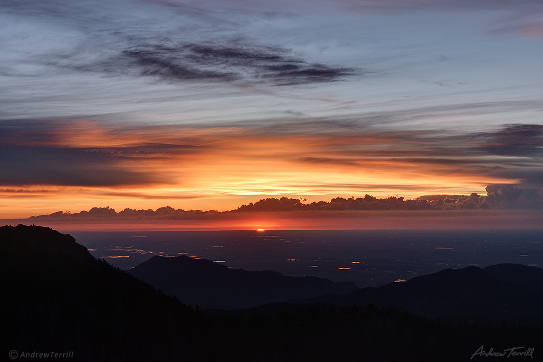 sunrise over the great plains seen from rocky mountains colorado sun on horizon