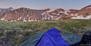 sunrise in rocky mountains from sleeping bag