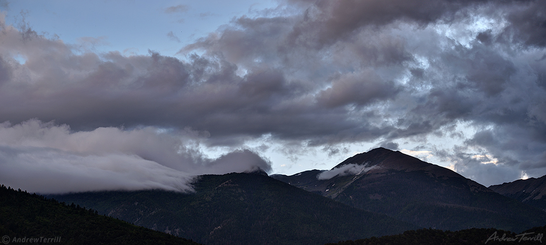 dispersing evening clouds over sangre di cristo range colorado