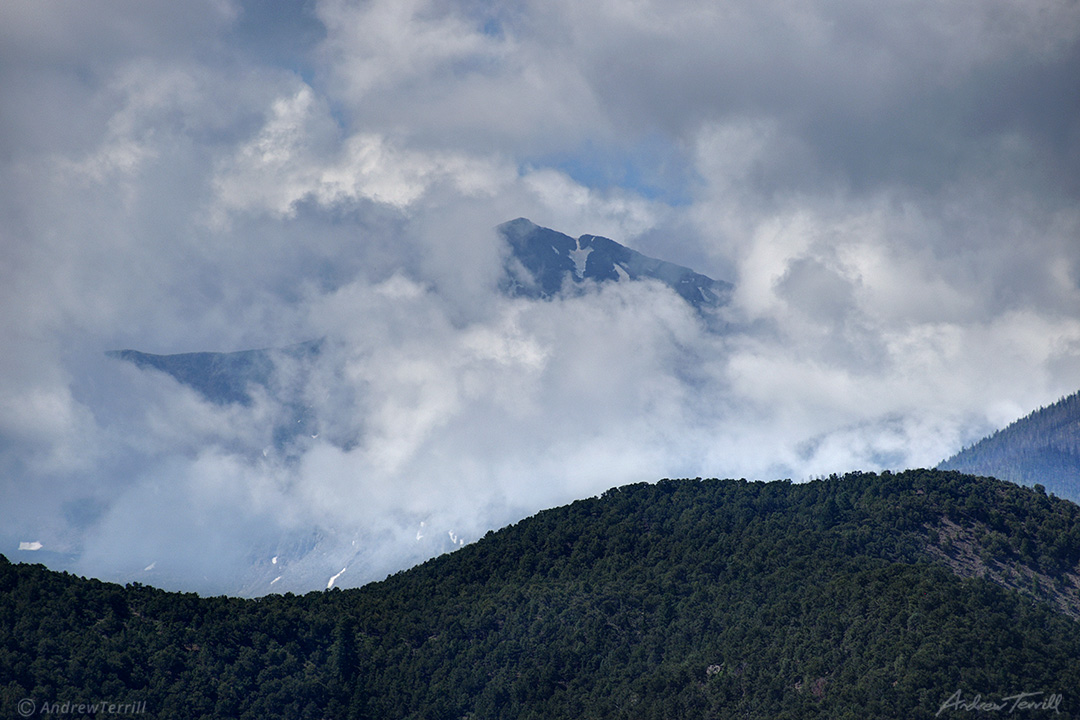 mountain appearing through clouds sangre di cristo range colorado