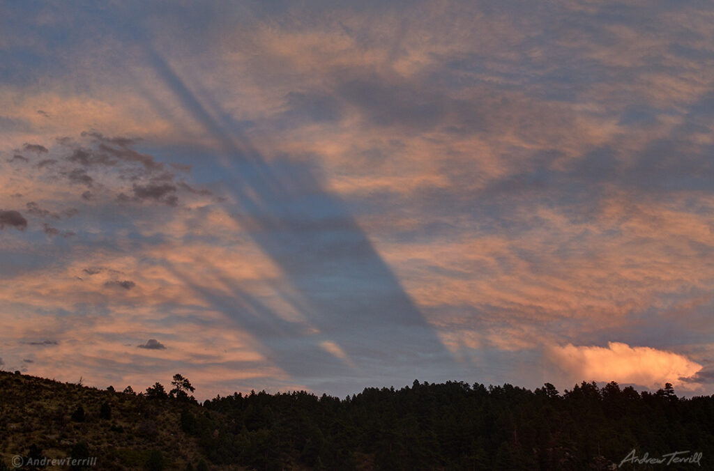 Crepuscular Rays and shadow bands at sunset in colorado