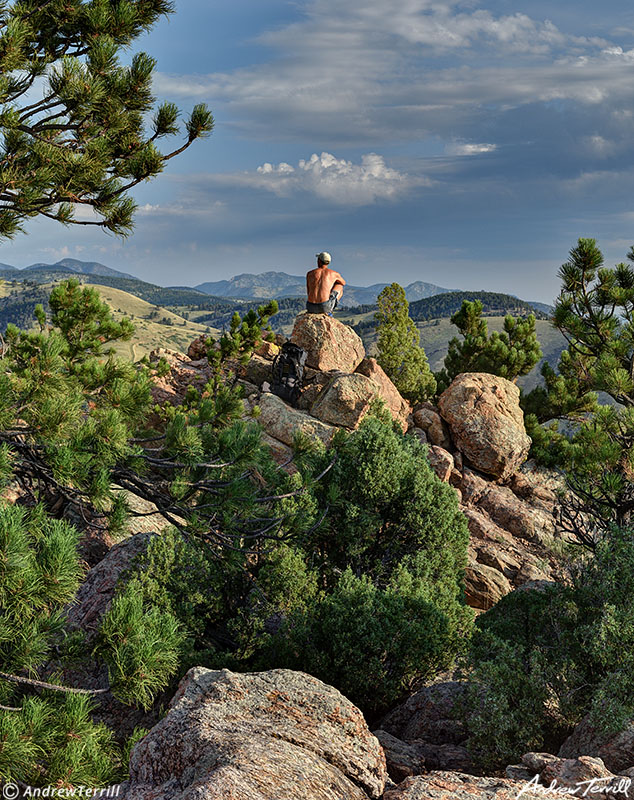 andrew terrill sitting on rock colorado foothills august 2021