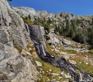 waterfall beneath storm lake indian peaks wilderness colorado