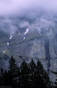 clouds and rock wall near kandersteg switzerland alps