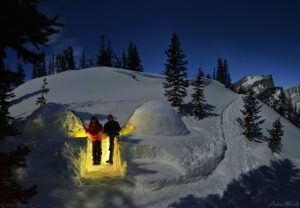 igloo ed and andrew terrill outside igloos in moonlight colorado