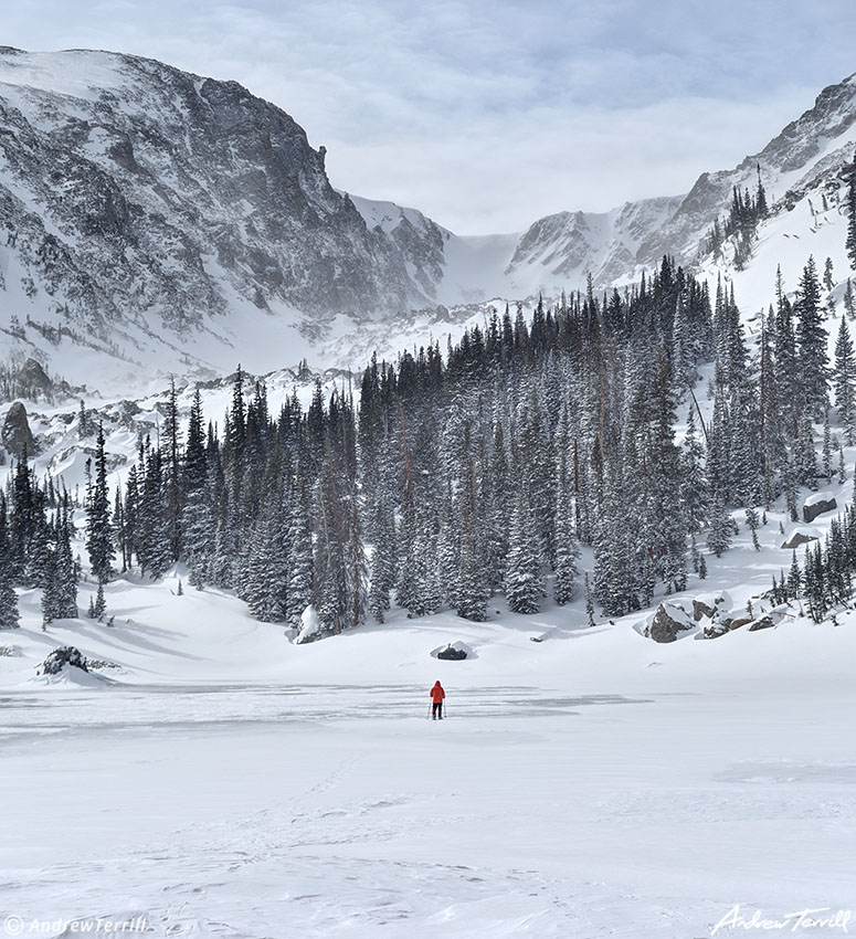 small figure on lake haiyaha rocky mountain national park