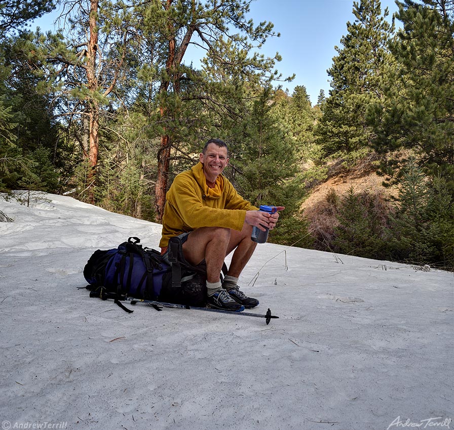 andrew terrill taking a break in forest