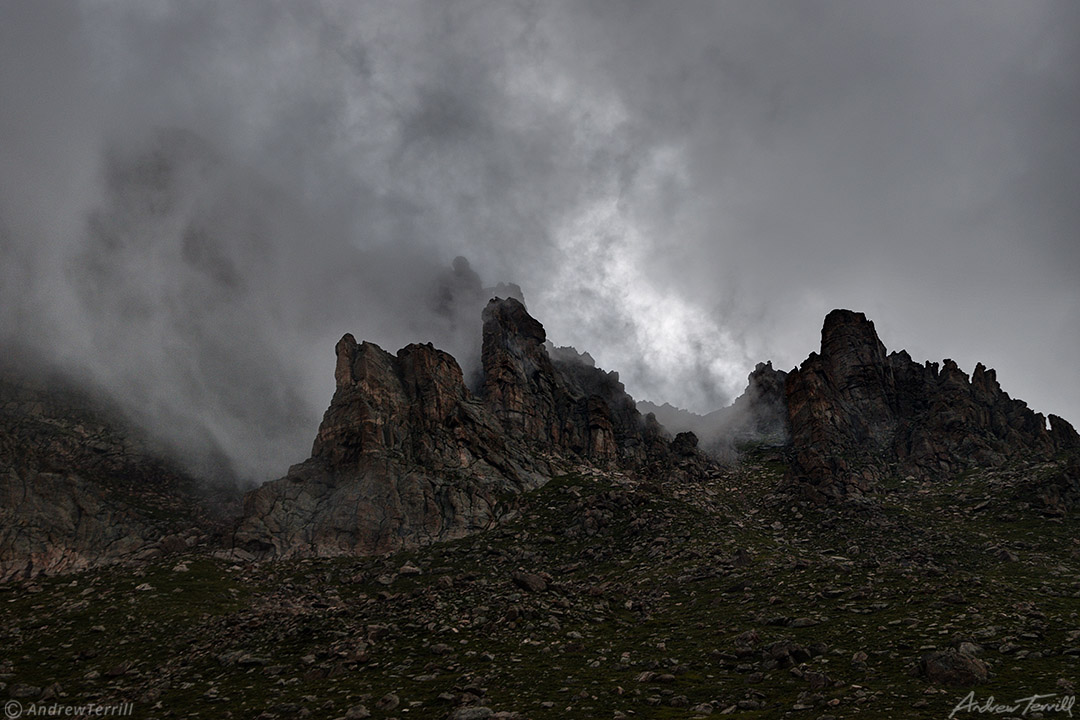 rock towers and storm clouds colorado mount evans mount blue sky