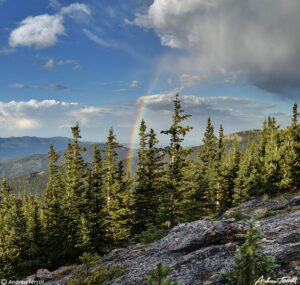 rainbow over the foothills colorado mount evans mount blue sky