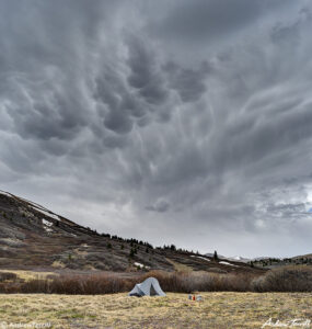 camp beneath stormy skies colorado mount evans mount blue sky