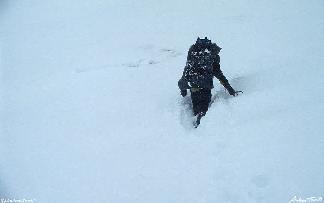 hiker in deep snow arctic norway