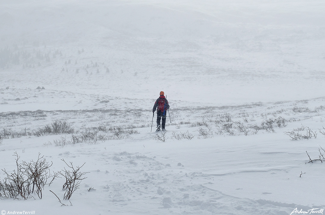 002 mountaineer heading towards mount bierstadt in wild winter weather snow colorado