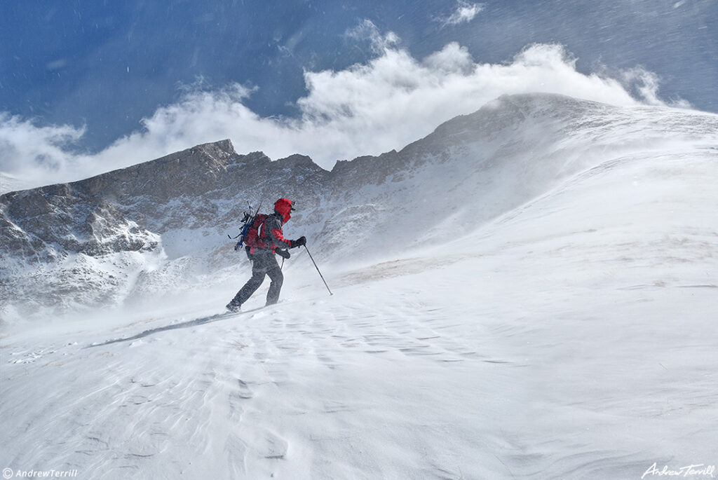 004 mountaineer and spindrift on mount bierstadt with sawtooth ridge in winter colorado