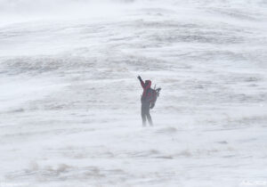 008 hiker pointing on tundra in spindrift colorado