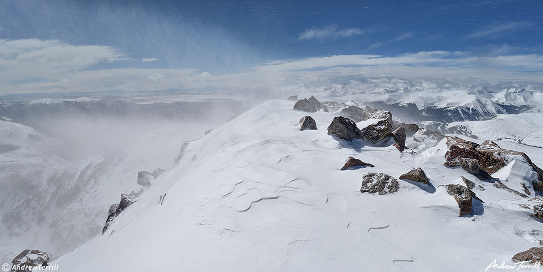 010 the summitof mount bierstadt colorado in strong winds with a plume of snowdrift