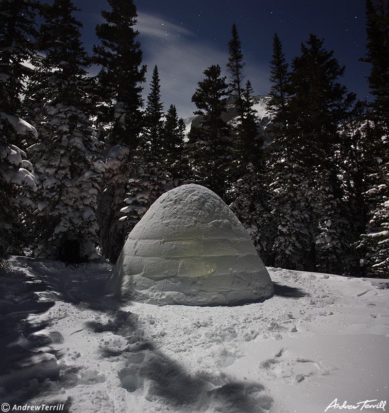 an igloo in moonlight colorado winter