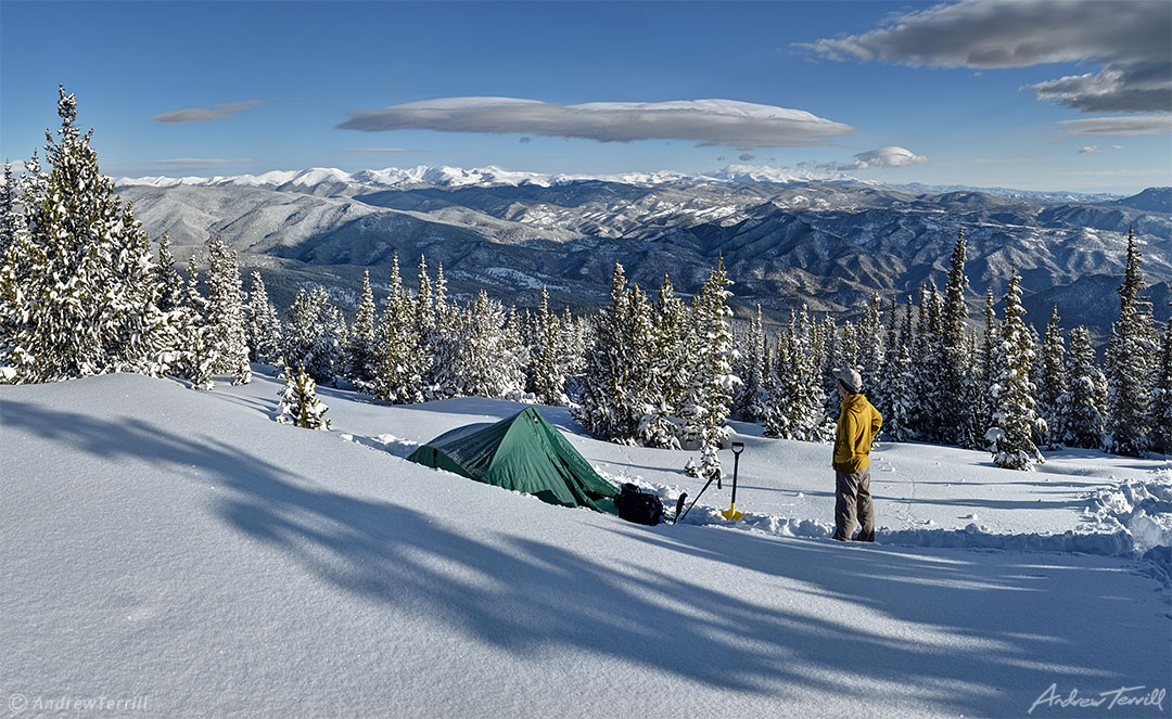 Winter camping in snow colorado rocky mountains staring at view