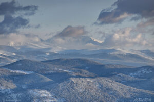 clearing clouds Longs Peak Rocky Mountain National Park winter snow