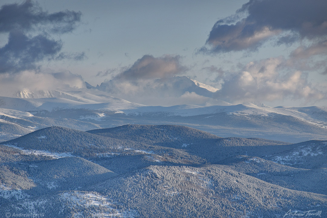 clearing clouds Longs Peak Rocky Mountain National Park winter snow