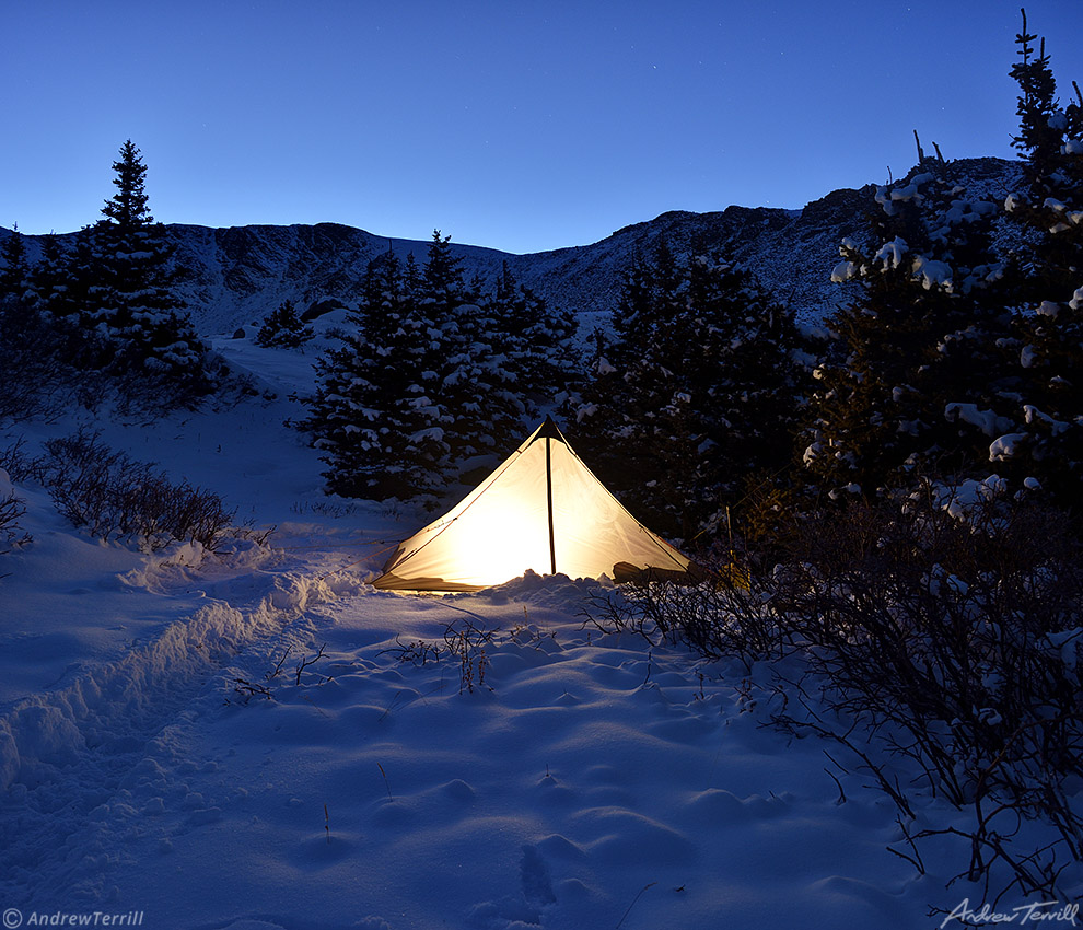 winter camp glowing tent mountains evening 9 November 2023