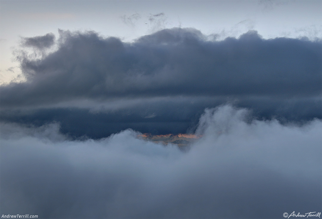 above the clouds plane and mountains - 10 may 2024