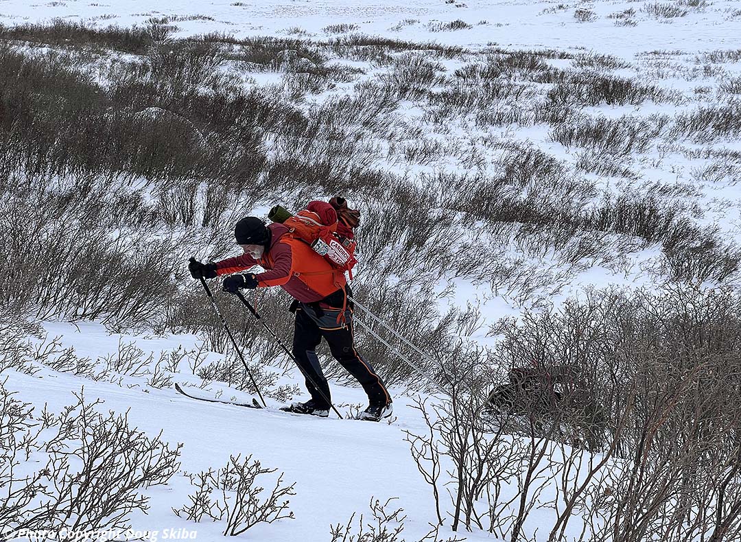 pulling a sled up steep ground