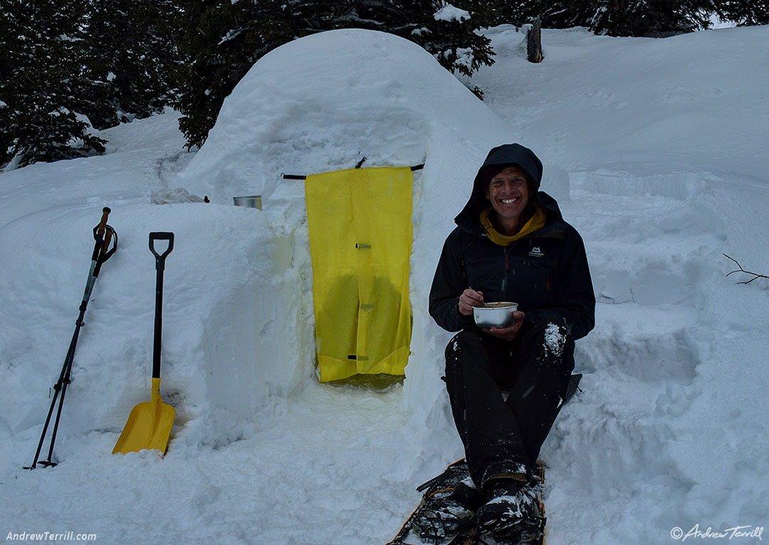 sitting outside an igloo