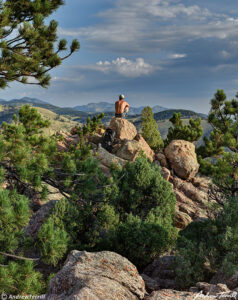 sitting on rock colorado foothills august 2021